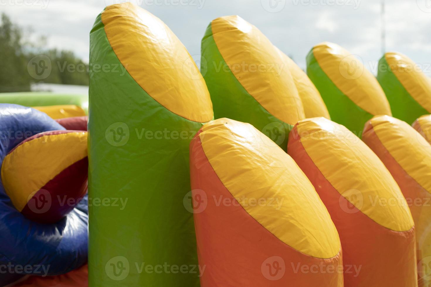 Children's fun in summer. Inflatable trampoline for jumping. photo