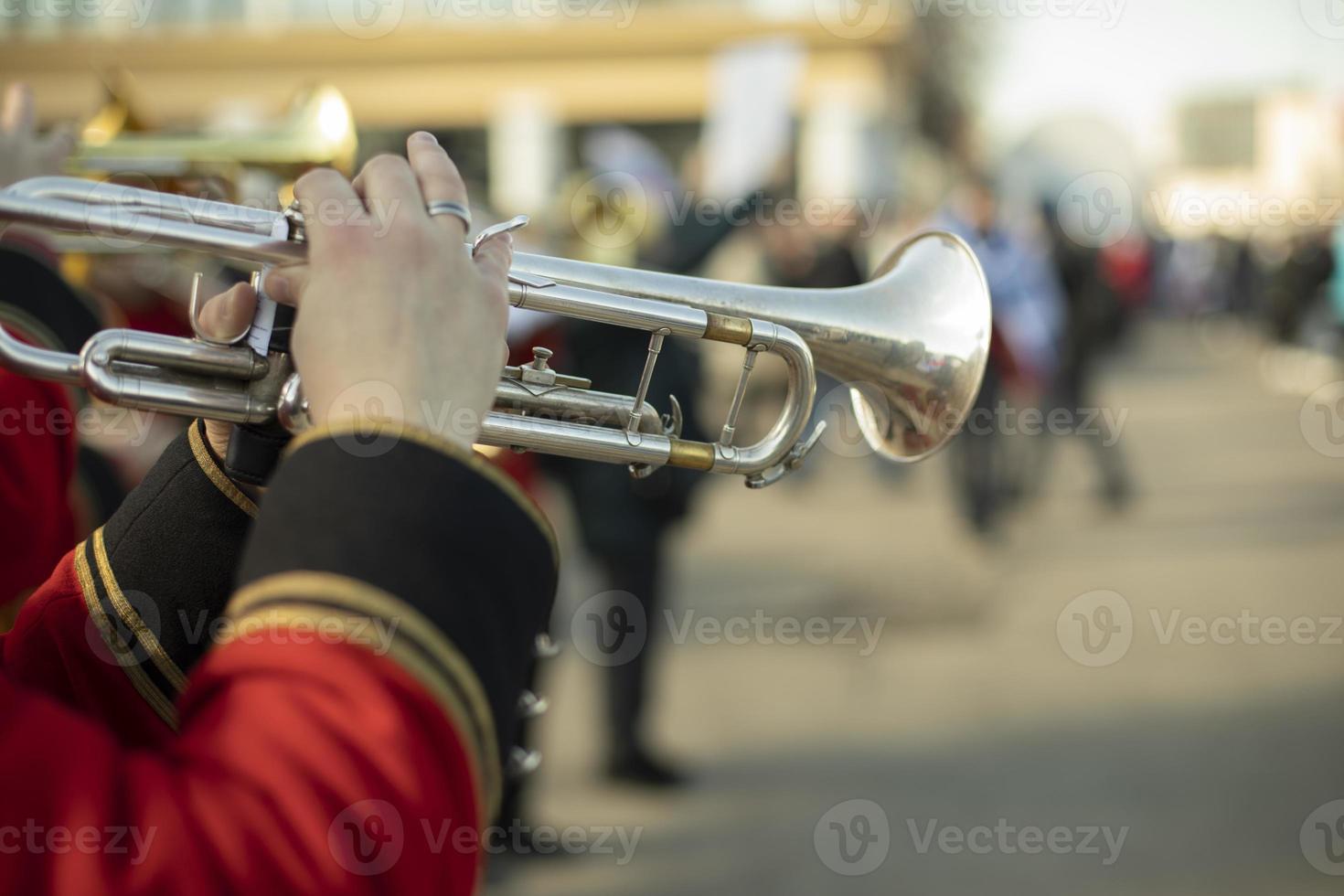 Orchestra with wind instruments. Trumpeters in ceremonial uniforms. photo