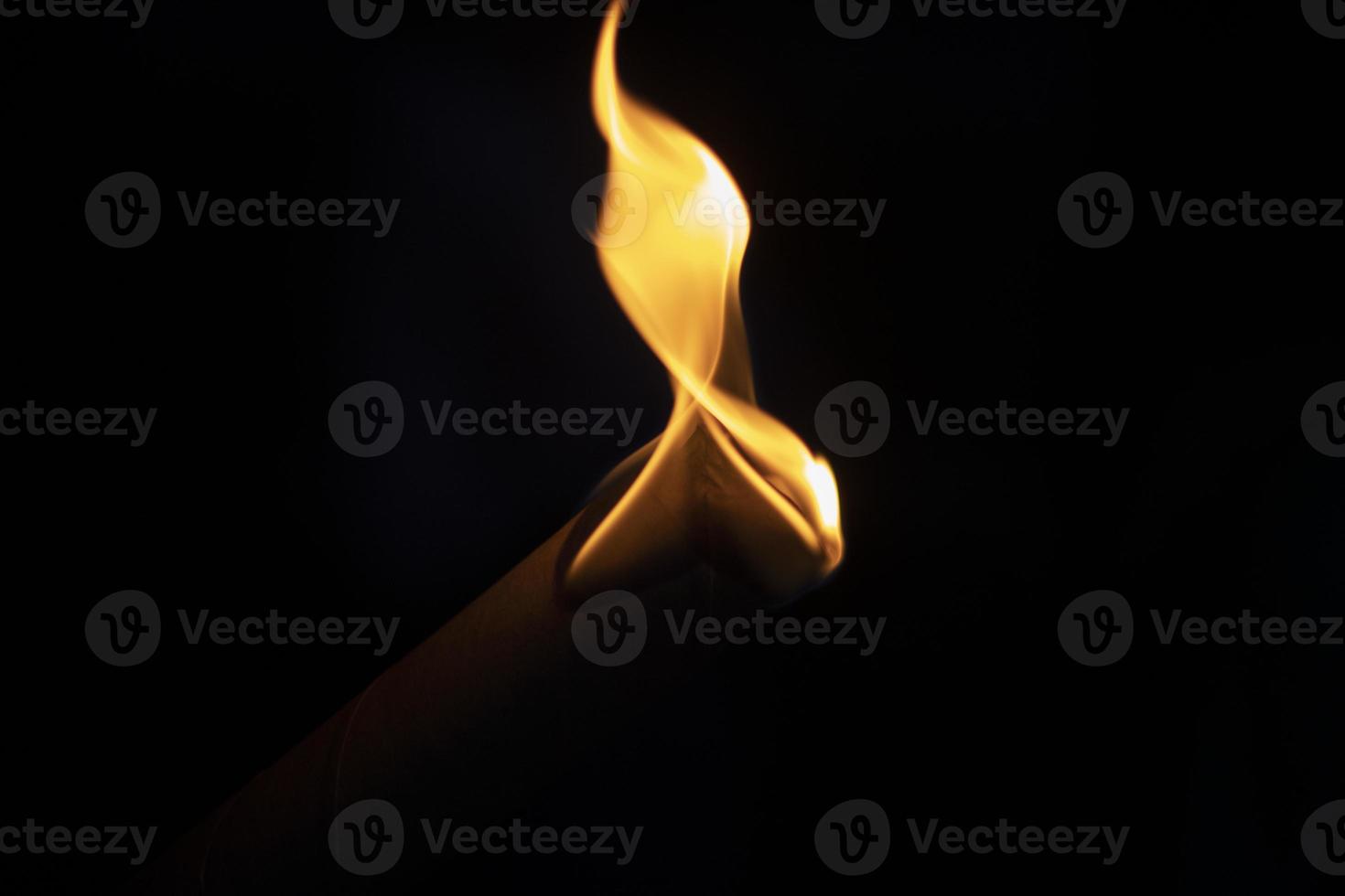 Fire on black background. Flames in dark. Details of fire. photo