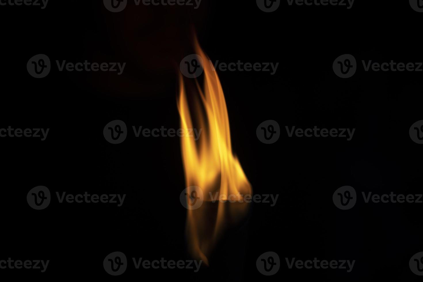 Fire on black background. Flames in dark. Details of fire. photo