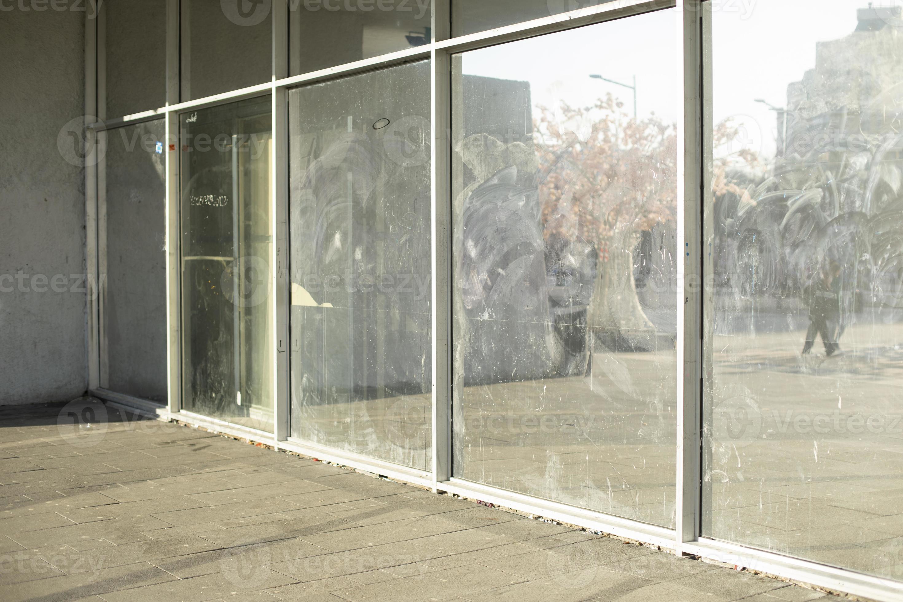 Dirty glass in display case. Broken glass in building. 11172062 Stock