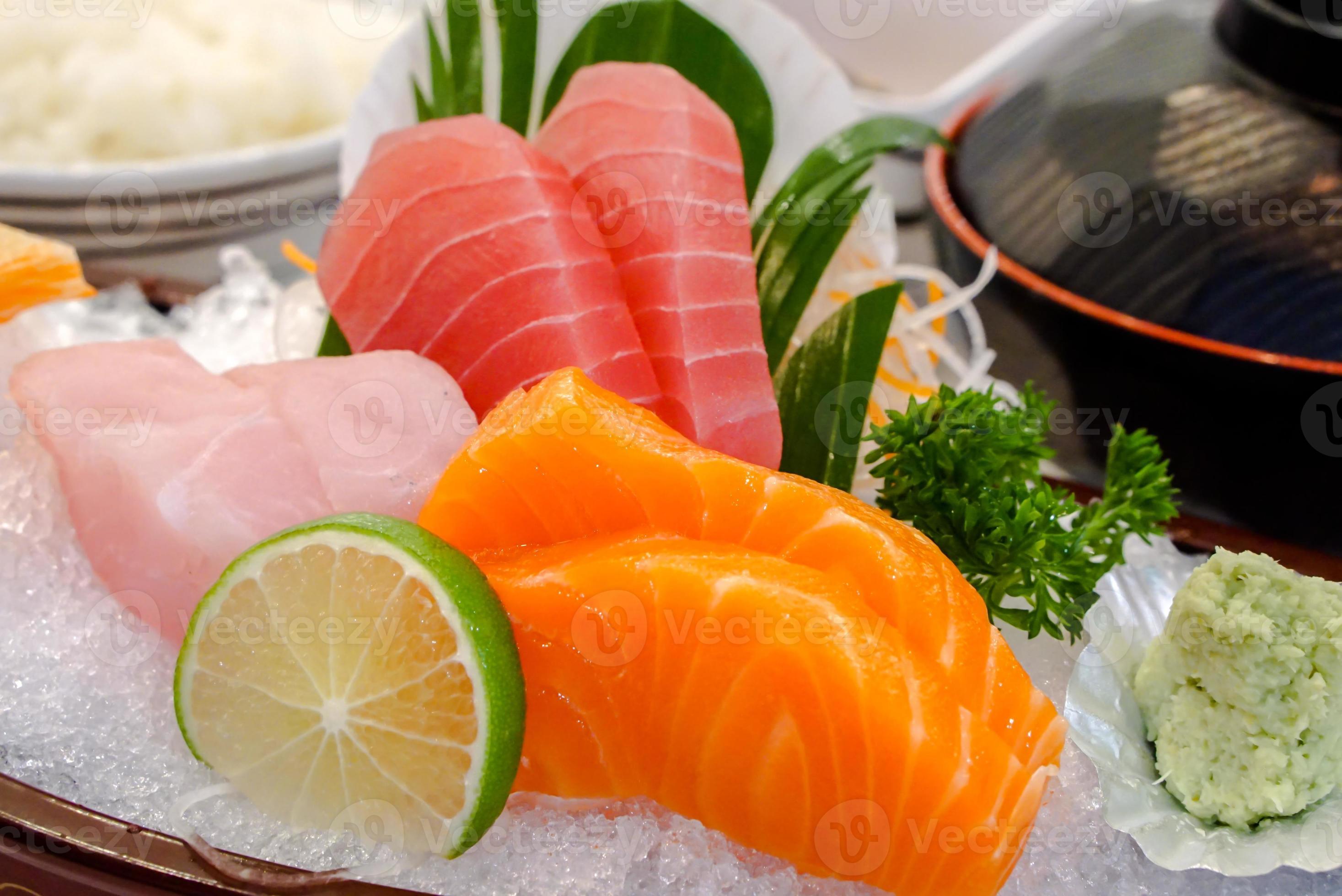 Closeup And Crop Japanese Sashimi Set On Boat Plate With Miso Soup In closeup-and-crop-japanese-sashimi-set-on-boat-plate-with-miso-soup-in