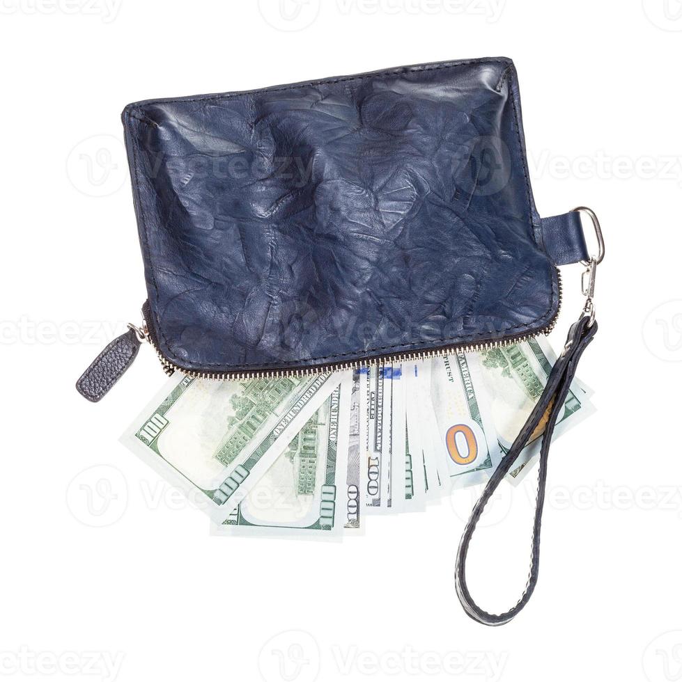 leather wristlet purse with many dollars isolated photo