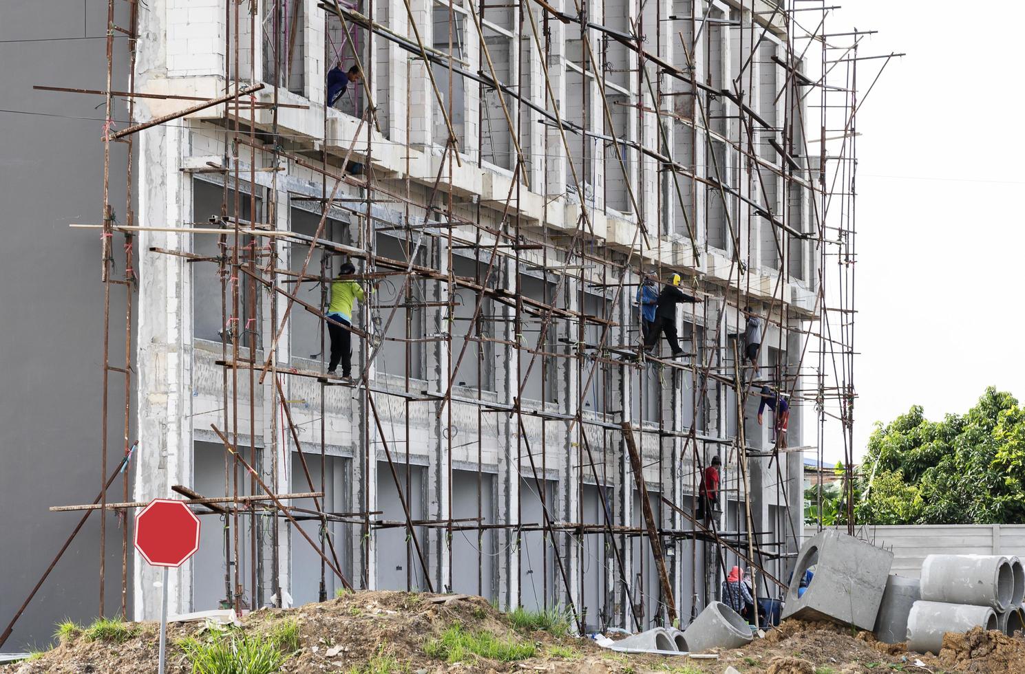 building construction site with steel scaffold photo