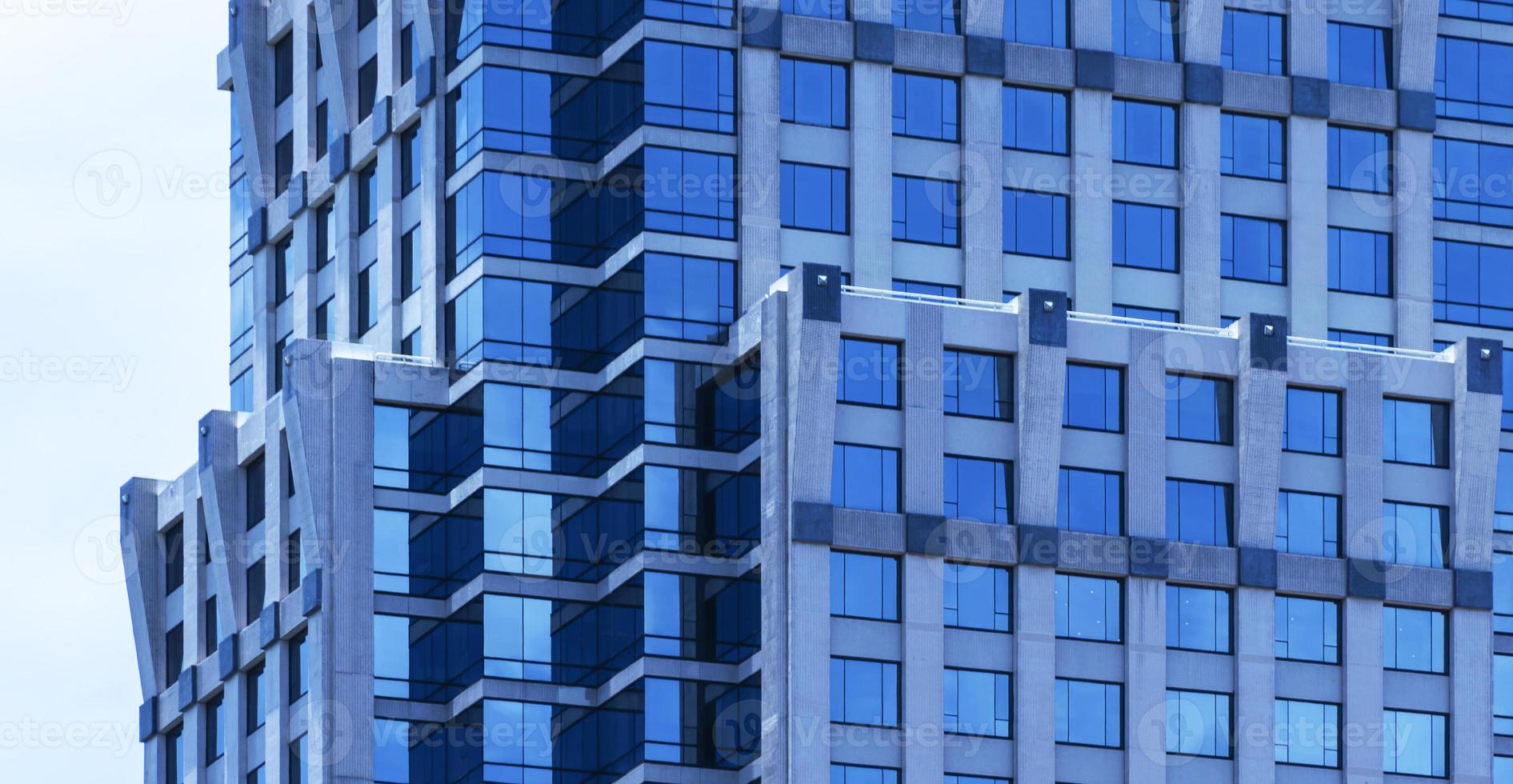 Modern office building with glass window photo