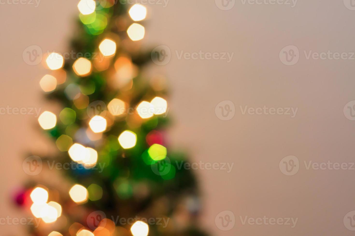 Christmas tree with bokeh light blur background photo