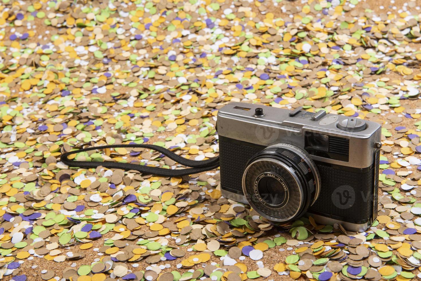 Background of confetti with elements related to the carnival and summer photo