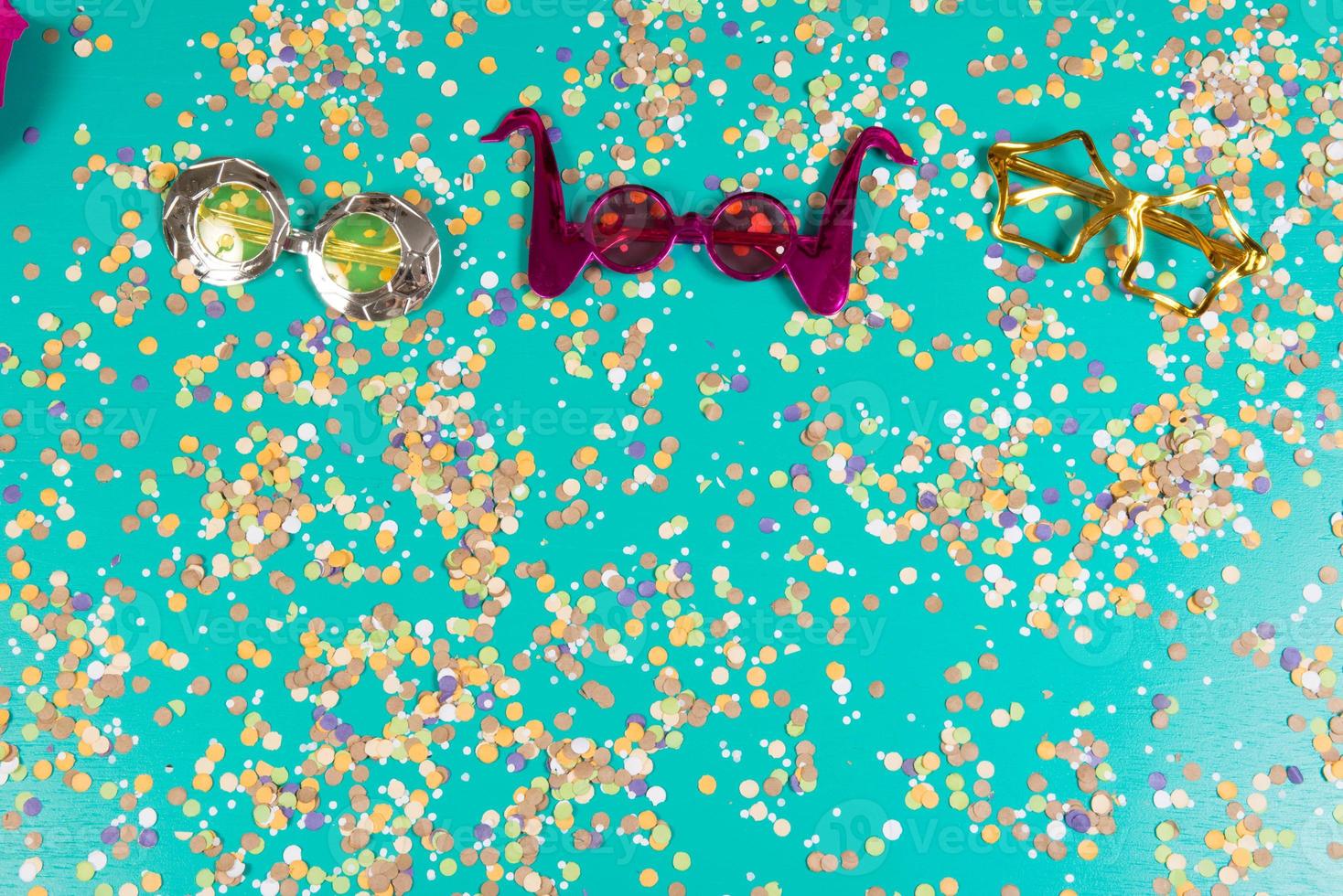 Background of confetti with elements related to the carnival and summer photo