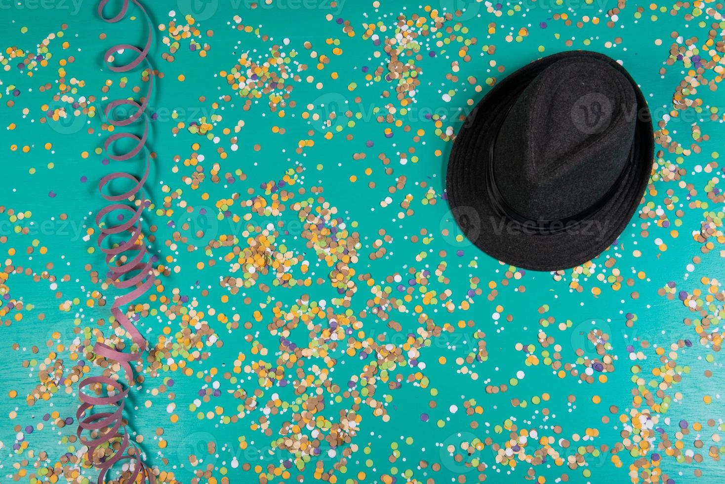 Background of confetti with elements related to the carnival and summer photo