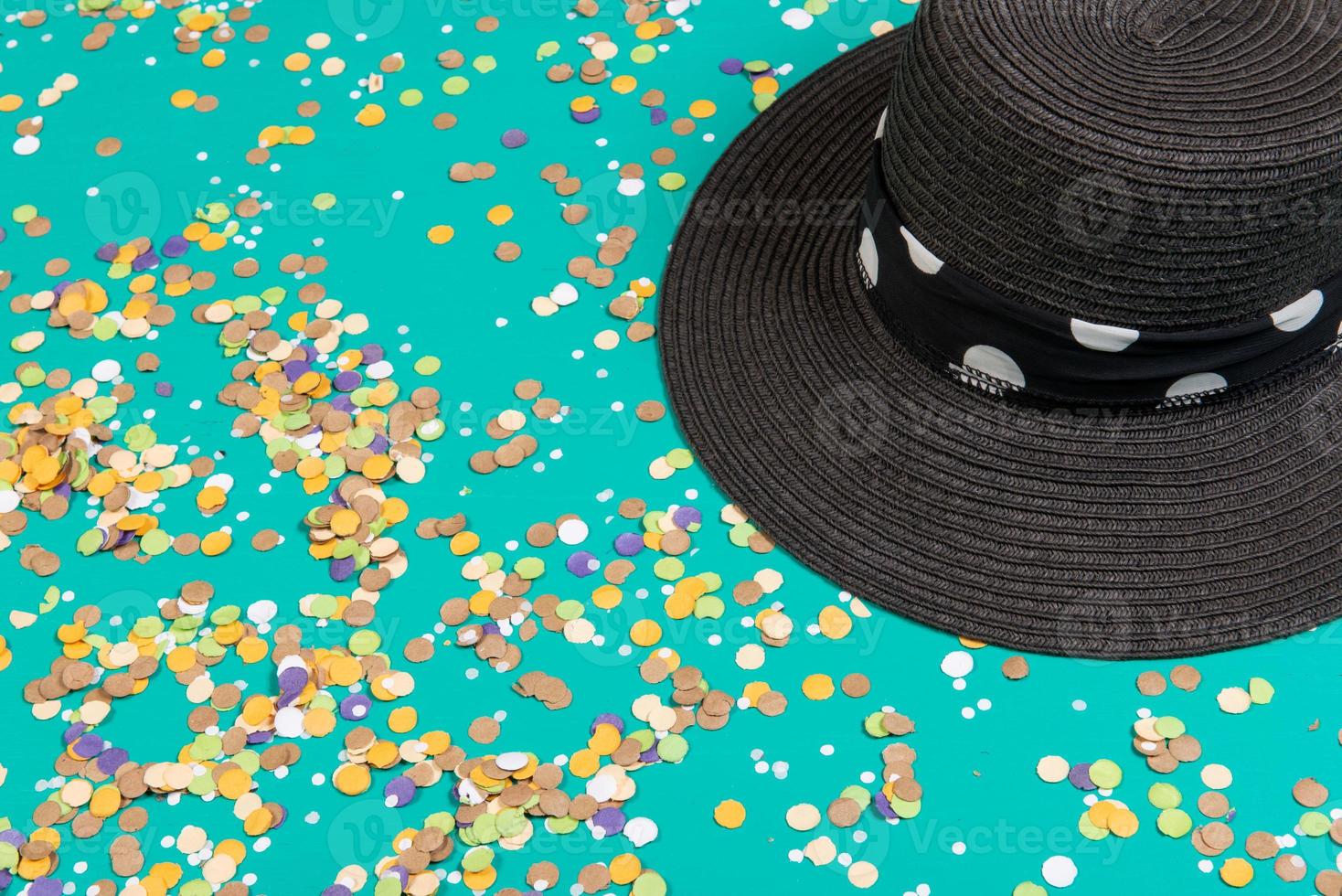 Background of confetti with elements related to the carnival and summer photo