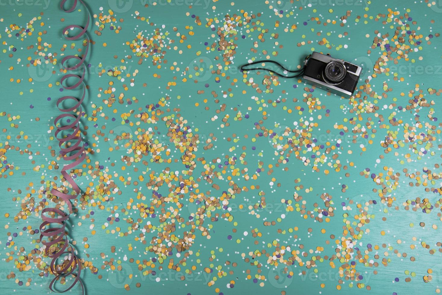 Background of confetti with elements related to the carnival and summer photo