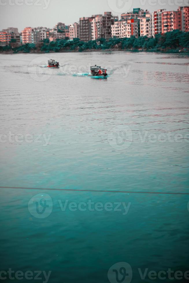 The motor boat on the river photo