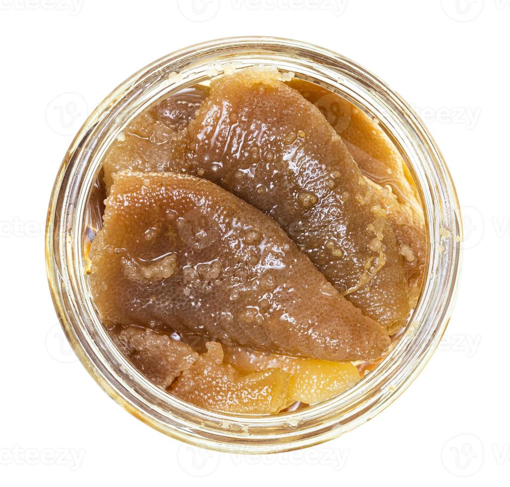 top view of herring roe in yastiki in glass jar photo