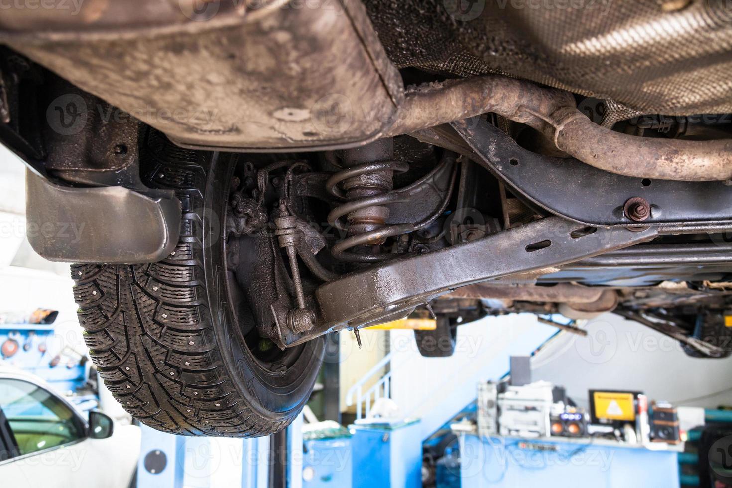 bottom view of vehicle on Shop Car Lift photo