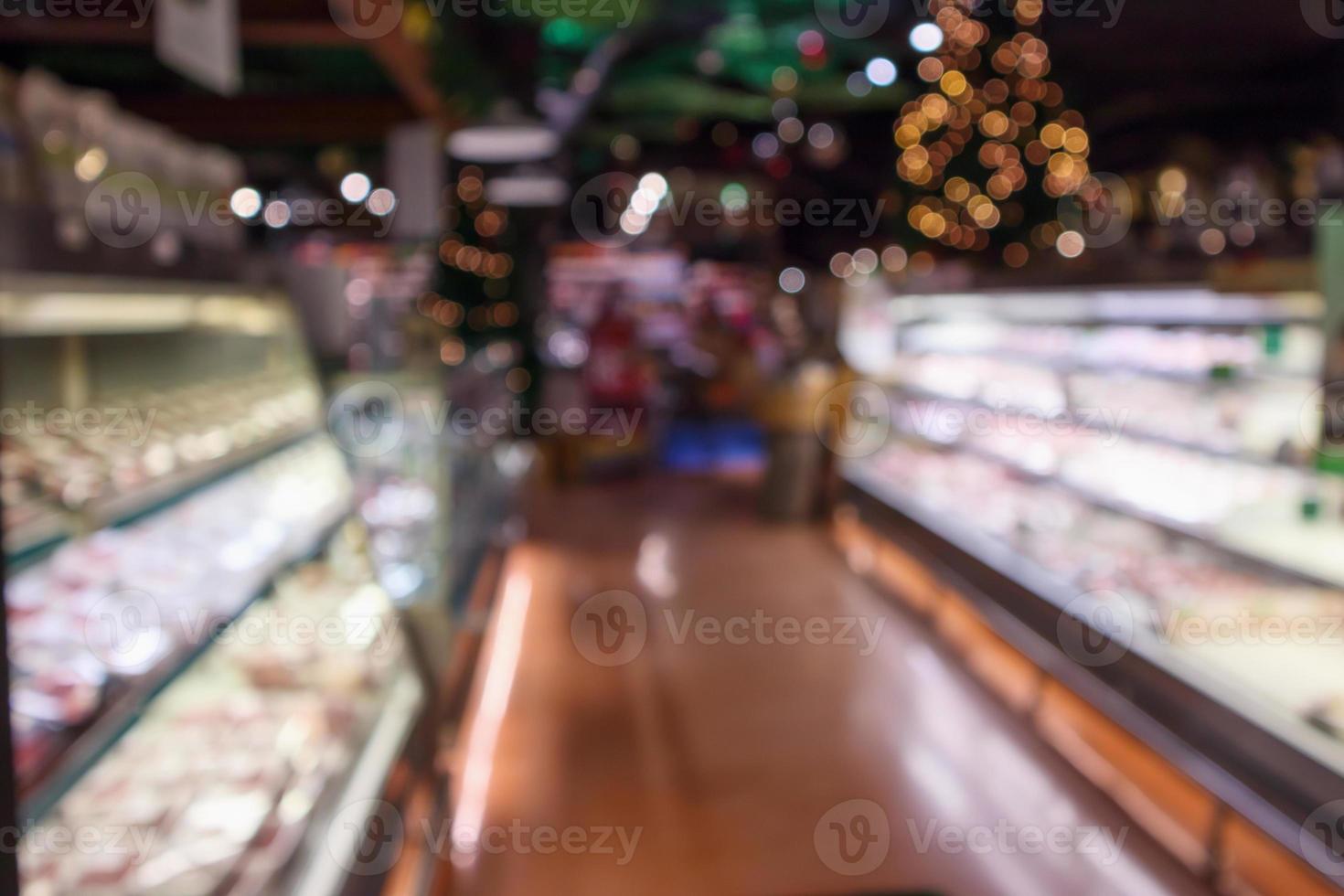 Abstract supermarket grocery store blurred defocused background with bokeh light photo