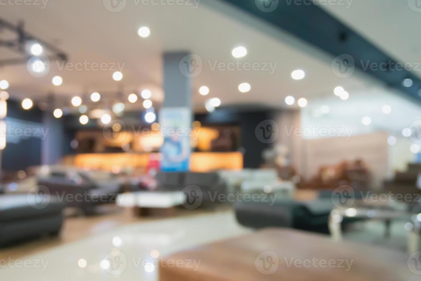 Abstract blur sofa in furniture store shop interior background for
