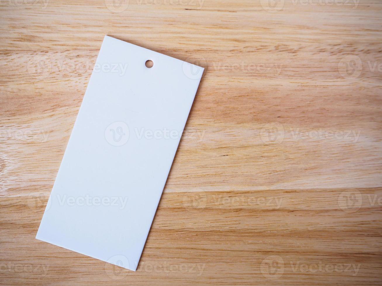 blank price label on wood background 11180615 Stock Photo at Vecteezy