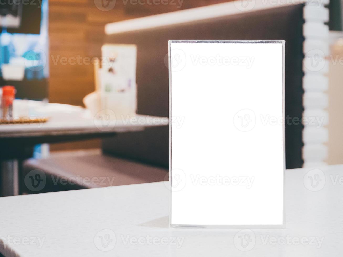 Blank Menu frame on Table in cafe restaurant photo