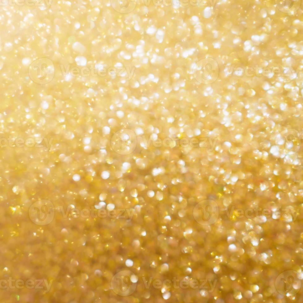 Christmas golden glow bokeh light blur abstract Background photo