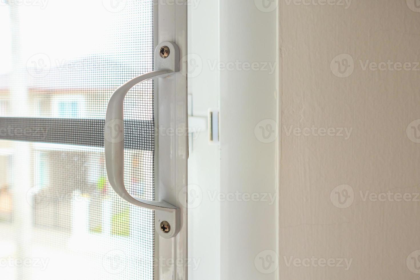 mosquito net wire screen on house window protection against insect photo
