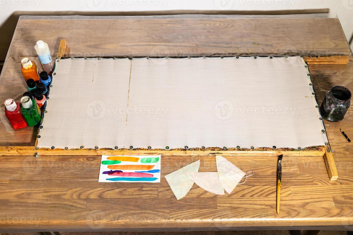 empty canvas fixed to wooden frame for batik photo