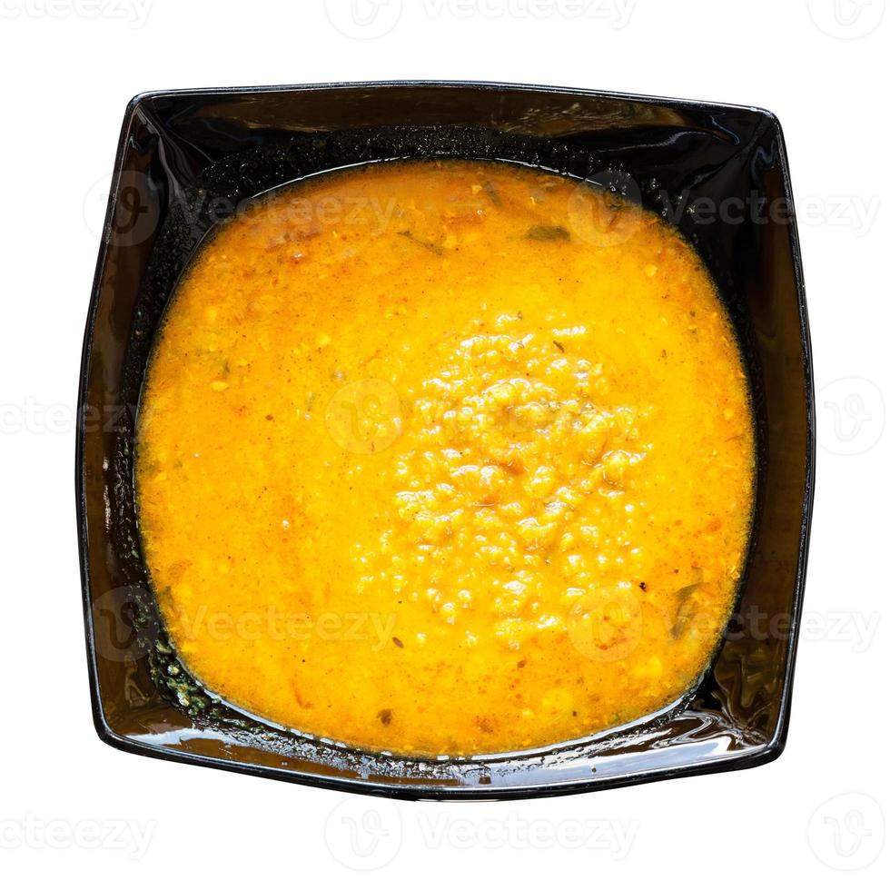 yellow Dal Tadka from lentils with curry in bowl photo