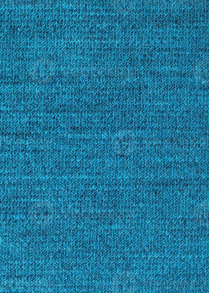 interlacing threads in wool jersey knitted fabric photo