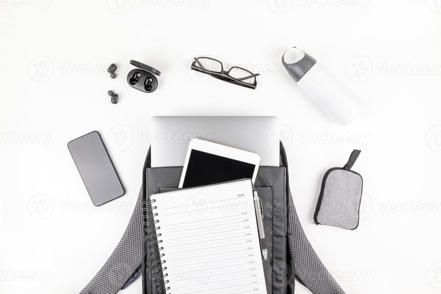 Modern backpack with laptop and tablet inside photo