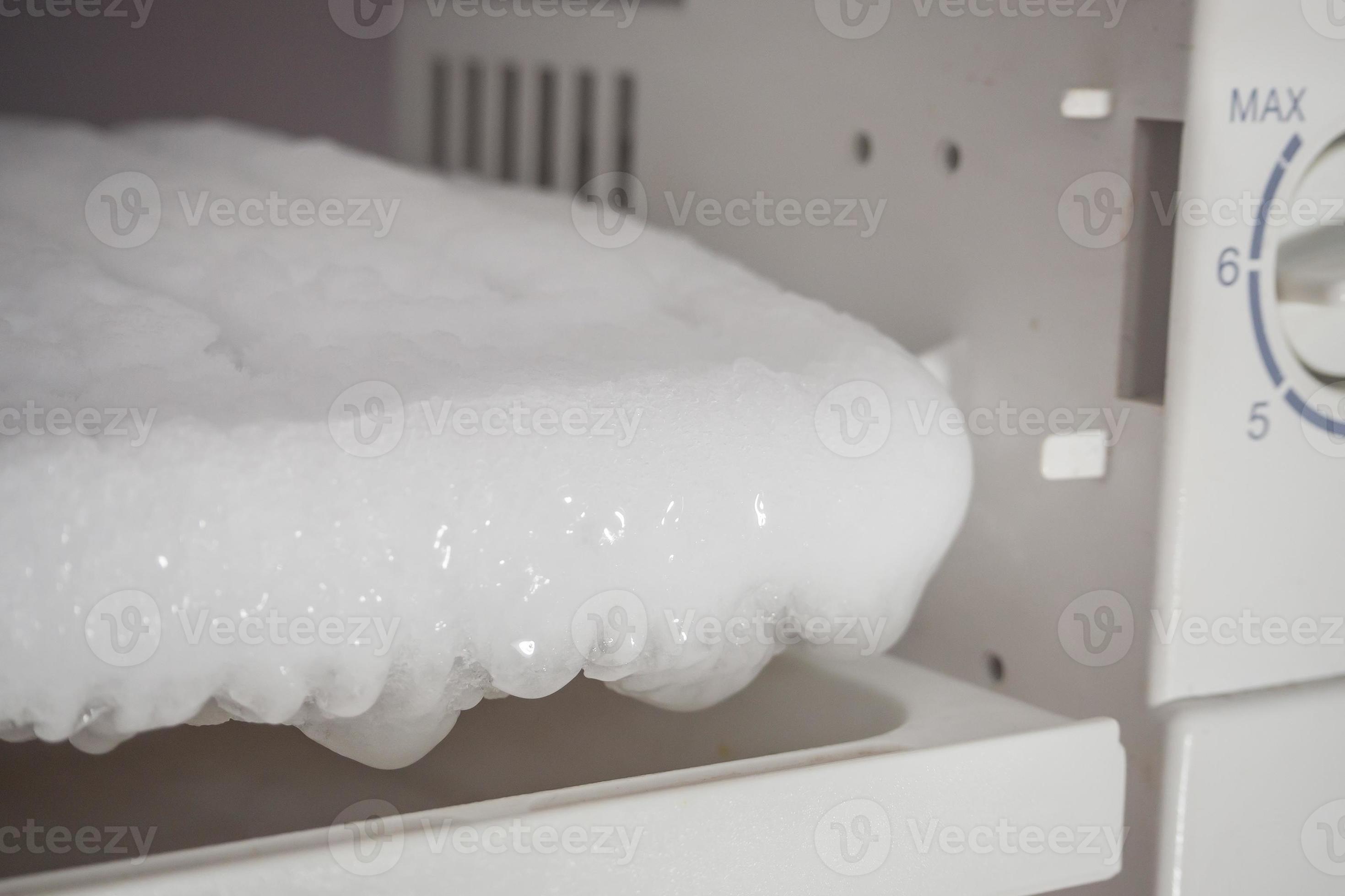 frozen Ice buildup in the freezer of refrigerator 11185835 Stock Photo