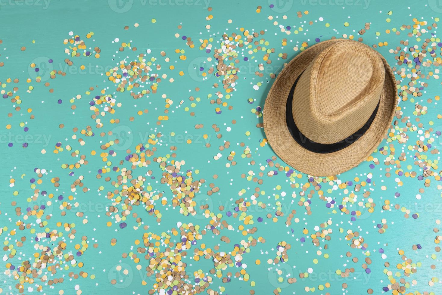 Background of confetti with elements related to the carnival and summer photo