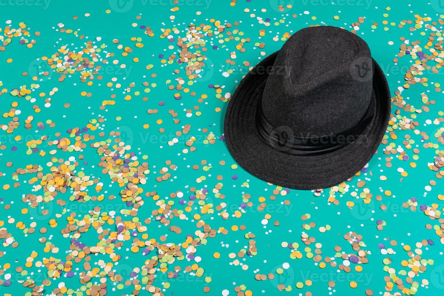 Background of confetti with elements related to the carnival and summer photo