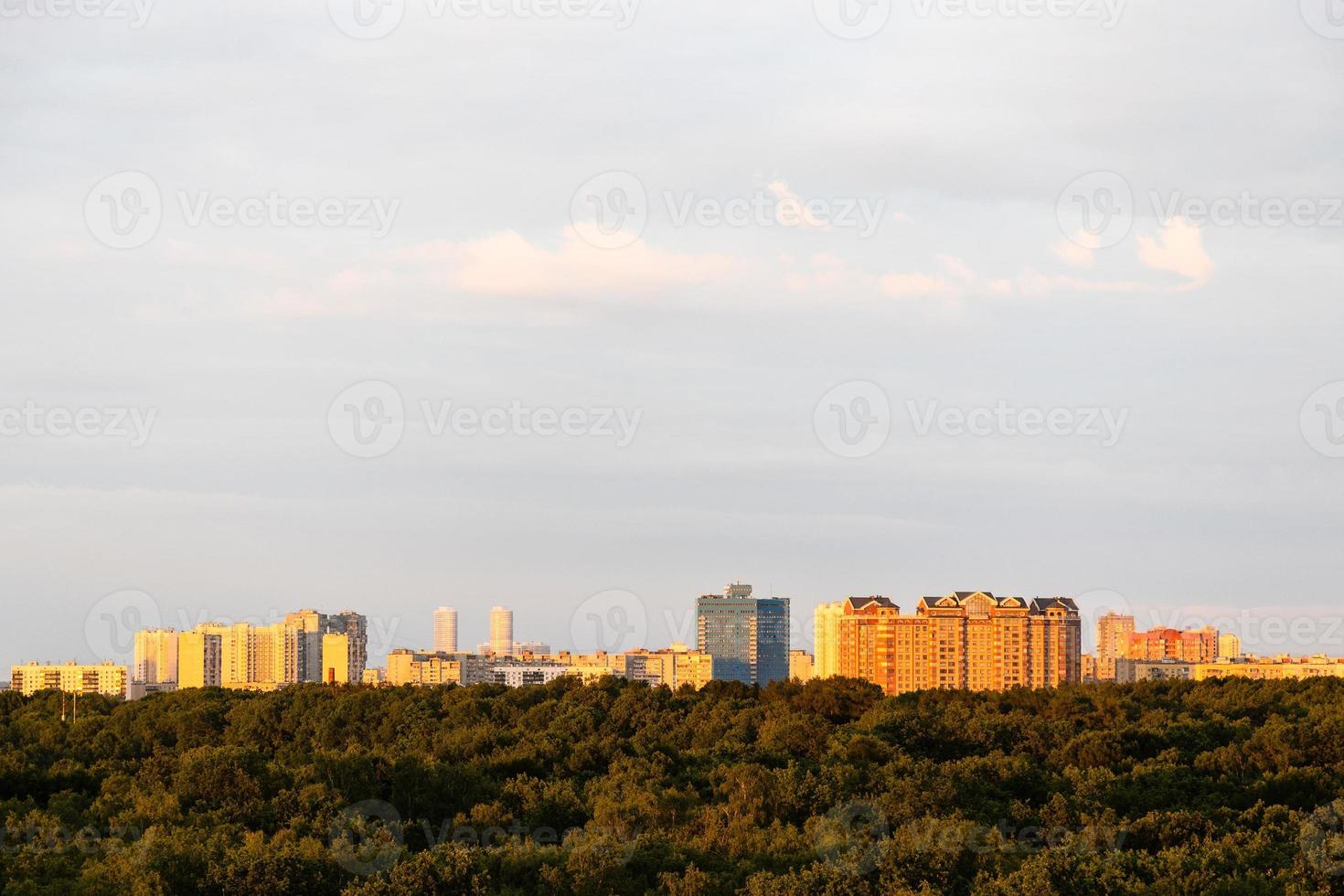 park and modern residential district on horizon photo