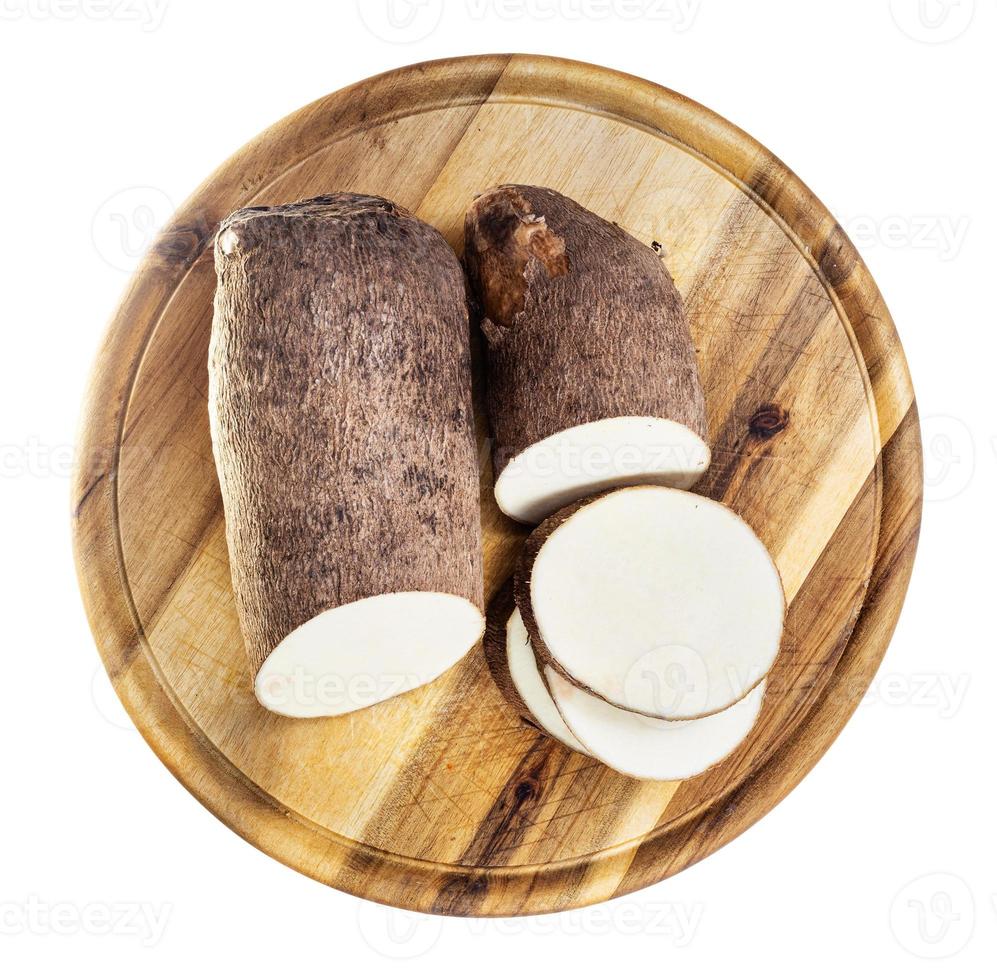 top view of sliced african yam on cutting board photo