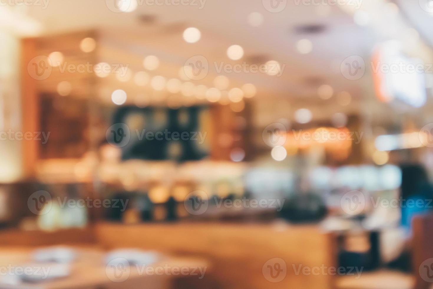 Cafe Restaurant interior with customer and wood table blur abstract background with bokeh light photo