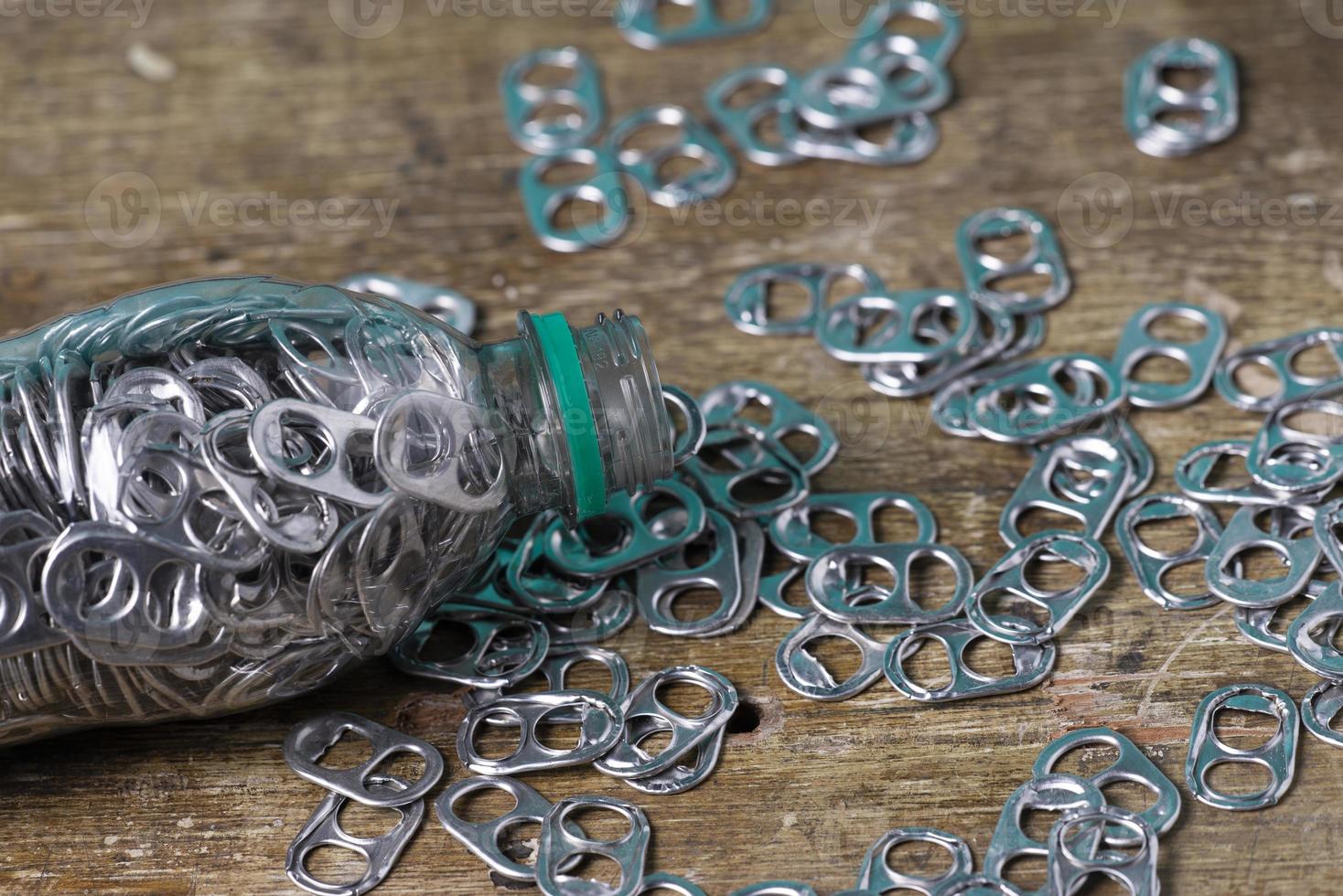 aluminum pull tabs 11194832 Stock Photo at Vecteezy