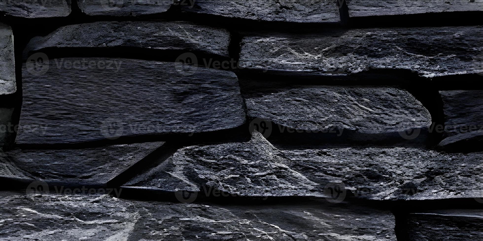 pared de ladrillo negro de textura y fondo de piedra oscura, imagen amplia del suelo de piedra foto
