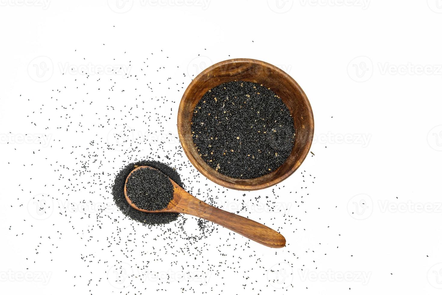 Nigella or black cumin with medicinal tulsi seeds on white background photo