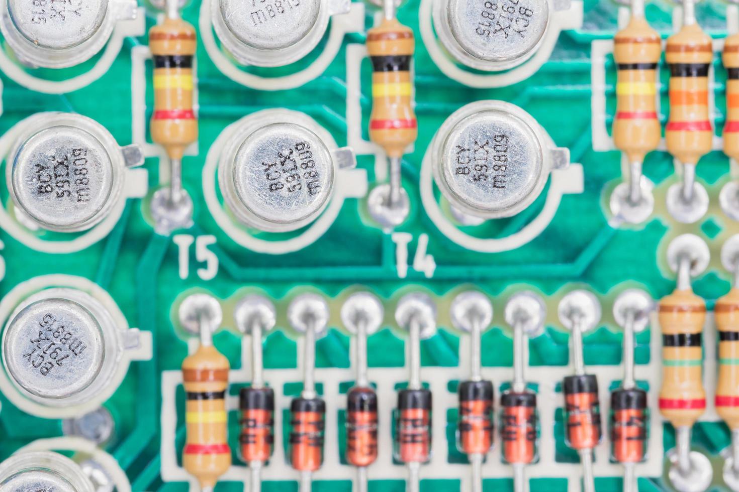 Condensers and Resistor assembly on the circuit board photo