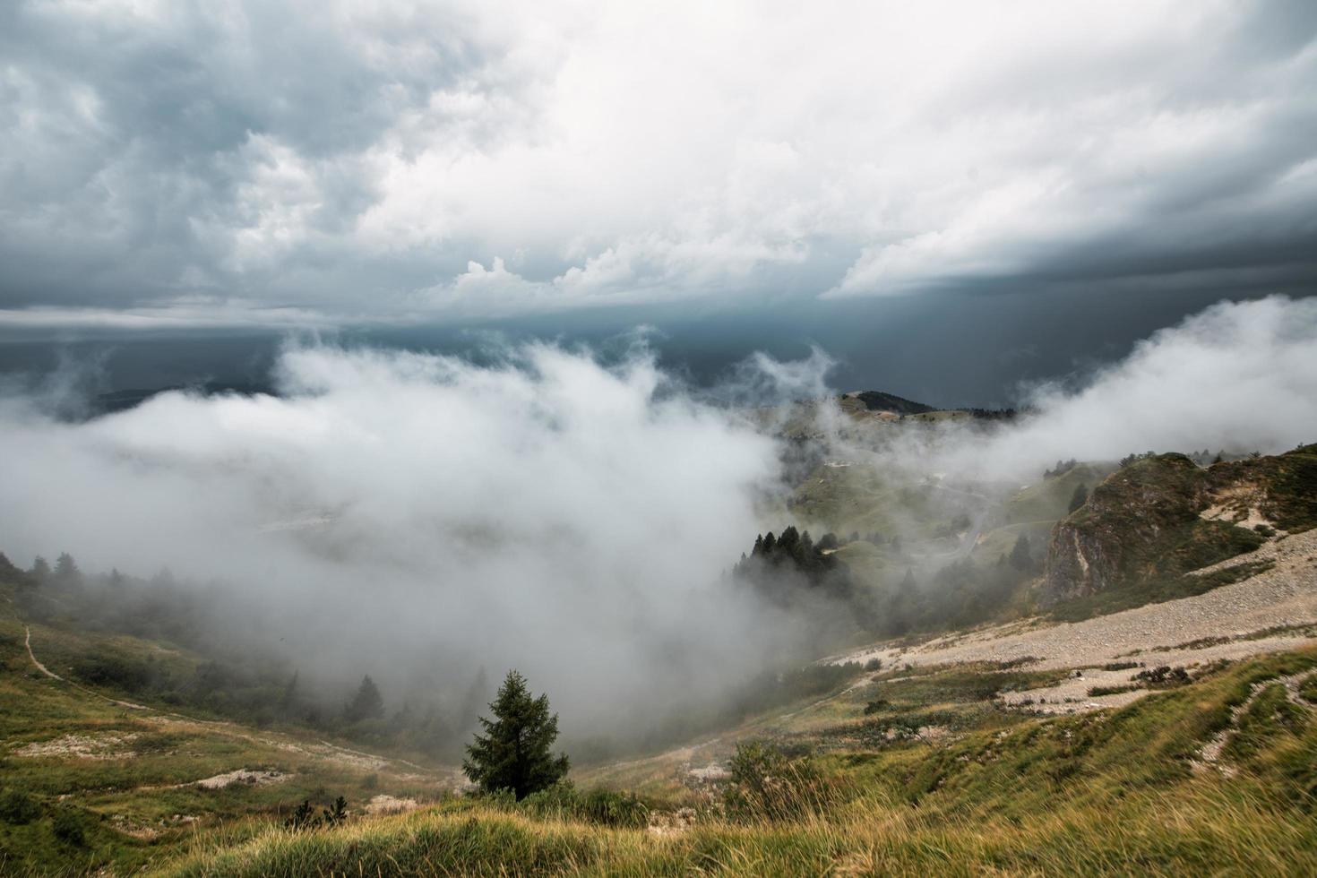 Alpine valley with clouds photo