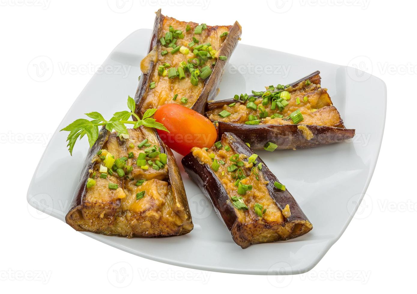 Grilled eggplant on the plate and white background photo
