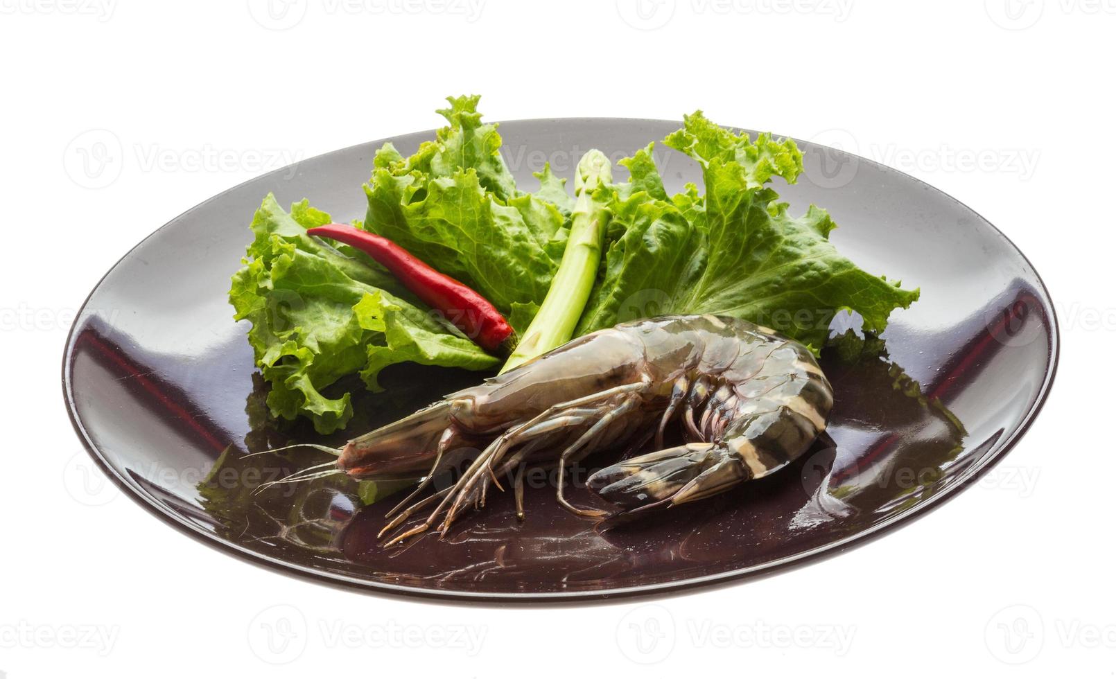 Tiger prawn on the plate and white background photo