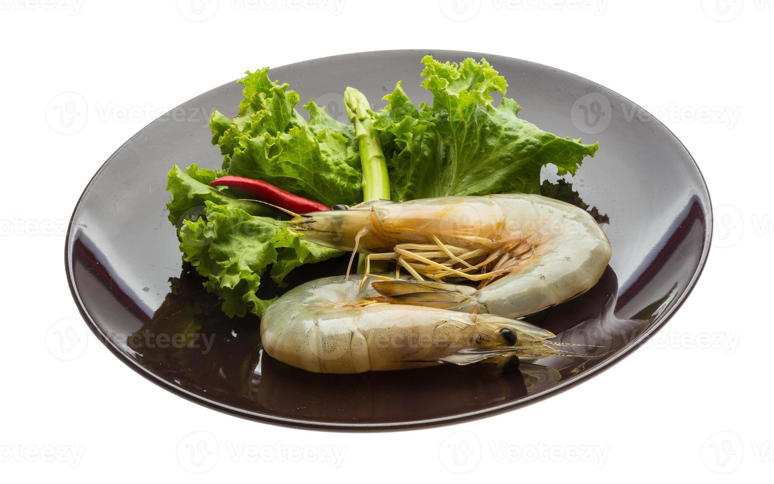Tiger prawn on the plate and white background photo