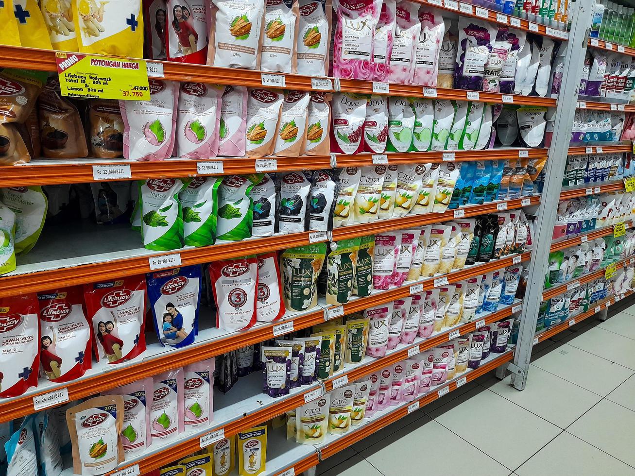 Jombang, East Java, Indonesia, 2022 - Rows of liquid bath soaps from various well-known brands in Indonesia and are halal. portrait display of personal care products in a shopping mall. photo
