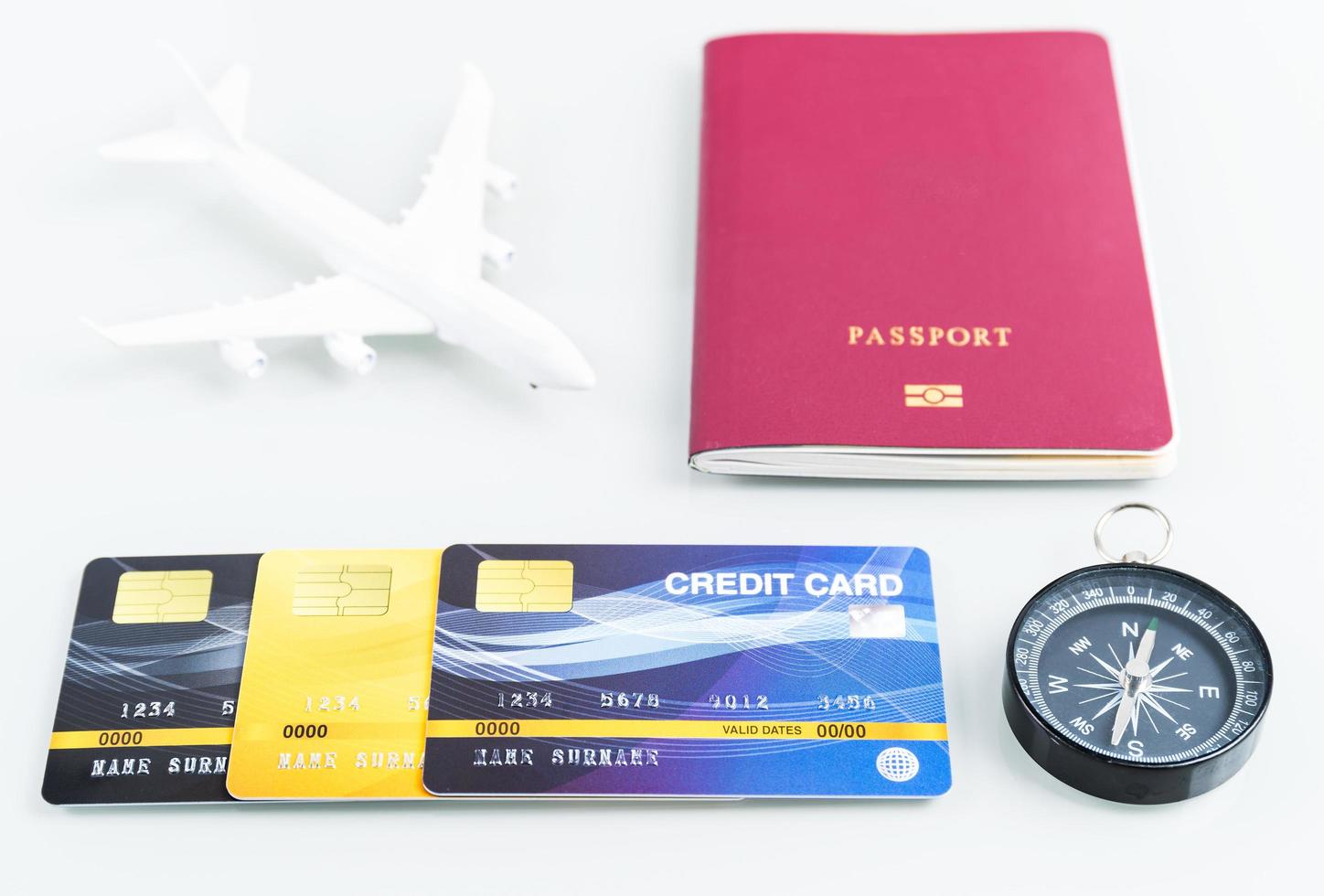 Passports and credit cards,airplane on white photo