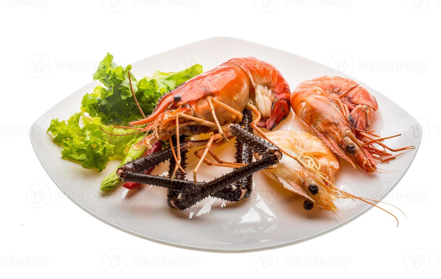 Giant Freshwater Prawn and king prawns on the plate and white background photo