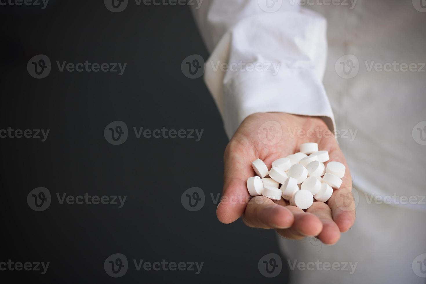 Hand full of pills. photo