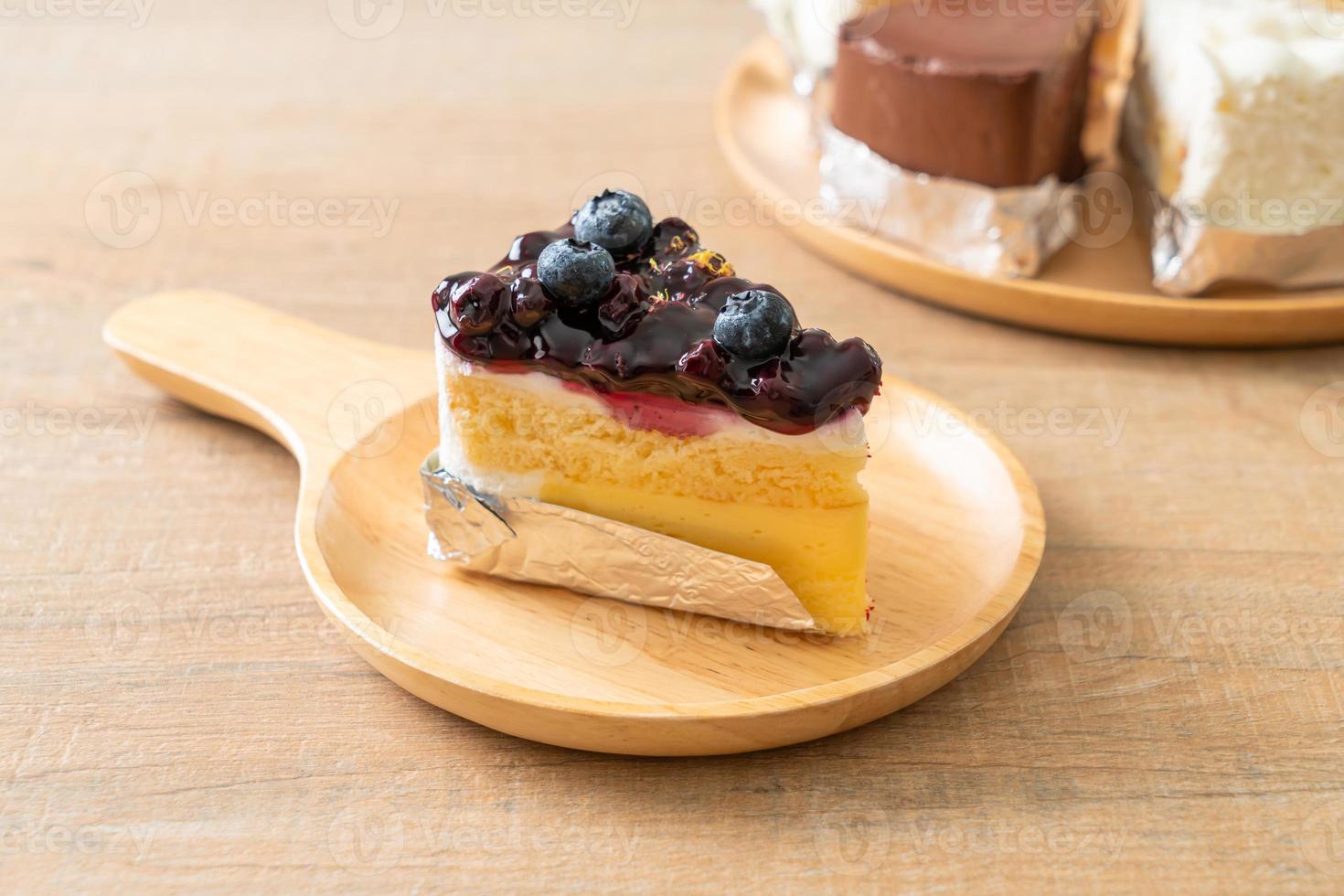 blueberry cheese cake on plate photo
