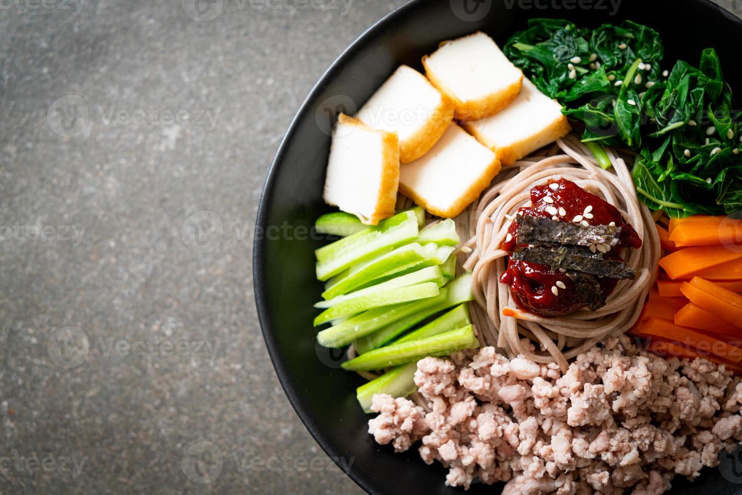 Korean spicy cold noodles 11219068 Stock Photo at Vecteezy
