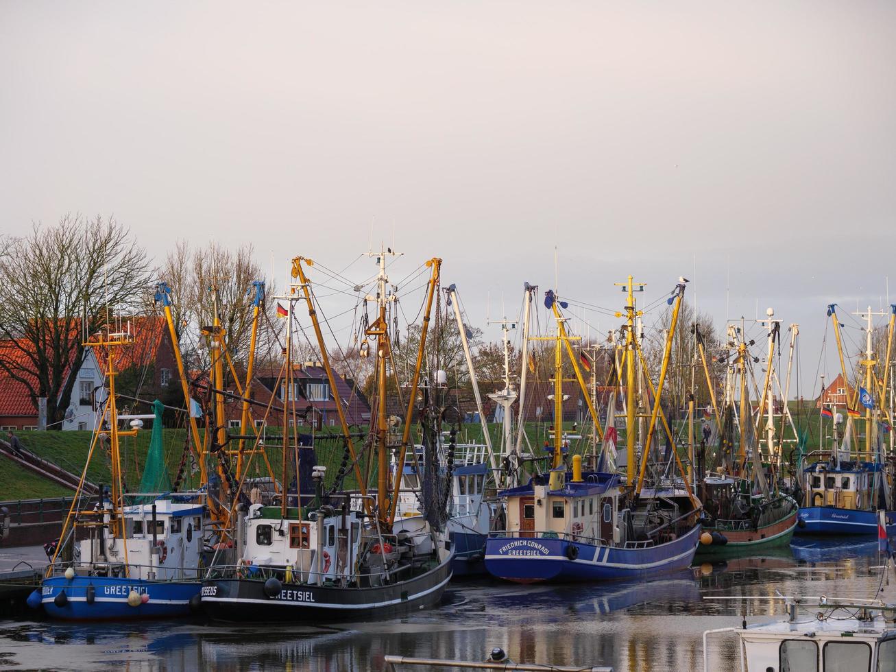 greetsiel,germany,2020-the village of Greetsiel at the north sea in germany photo