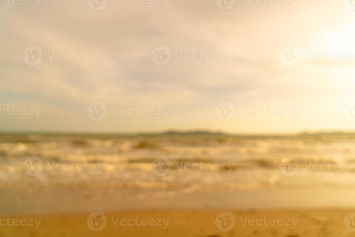 abstract blur beautiful sea beach with sunset time for background photo
